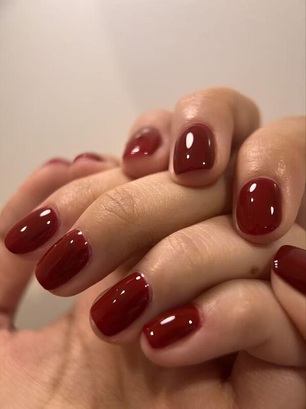 Burgundy single colour structured gel at KK Nail Studio, Long Island City nail salon