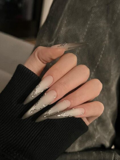 Chrome textured metal stiletto set at KK Nail Studio, Long Island City nail salon