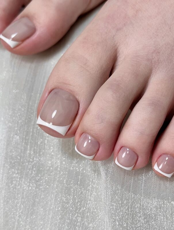 Classic French gel pedicure at KK Nail Studio, Long Island City nail salon