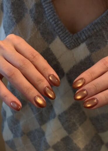 Copper cat eye manicure at KK Nail Studio, Long Island City nail salon