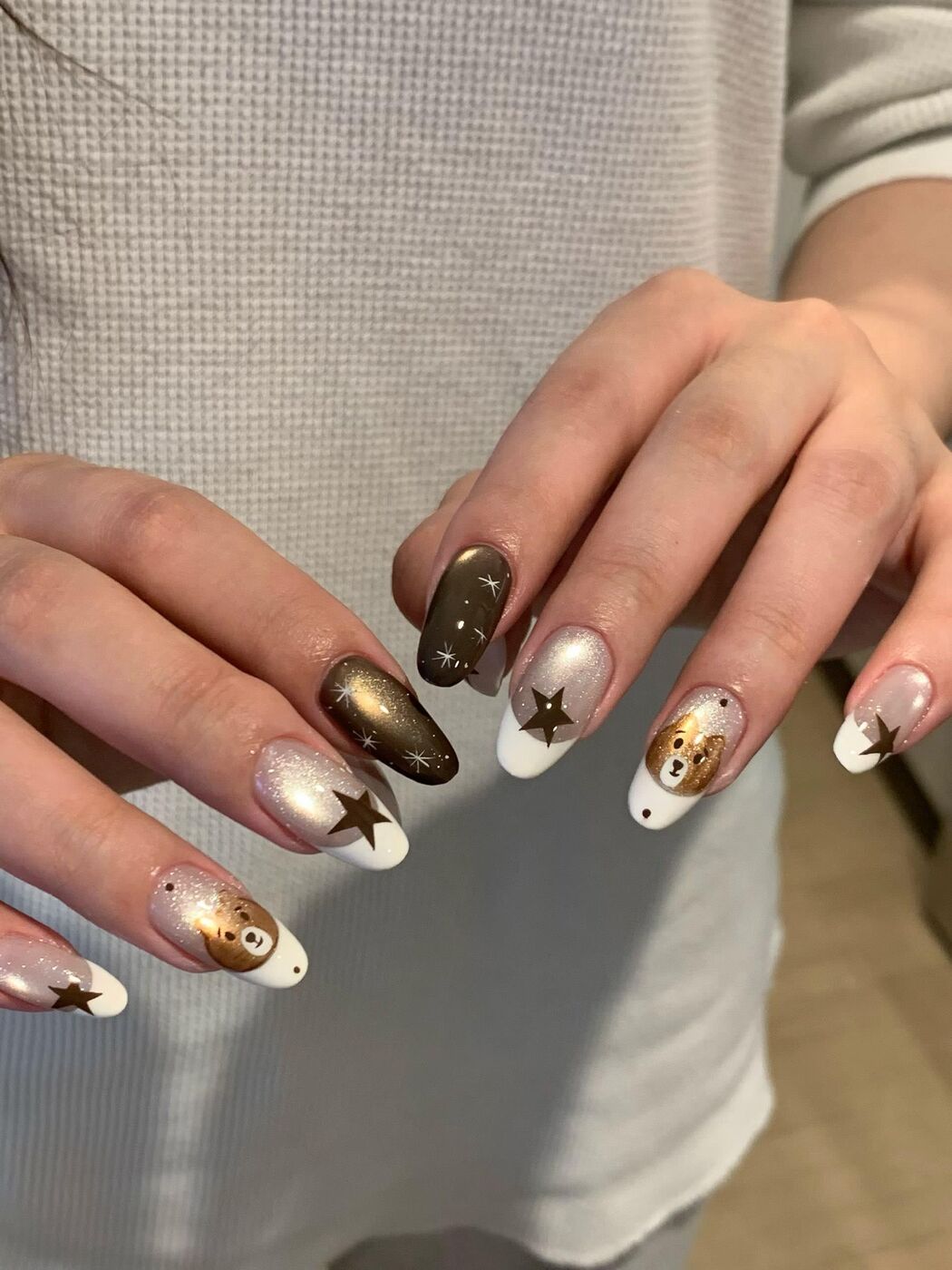 Gold chrome star nail art at KK Nail Studio, Long Island City nail salon