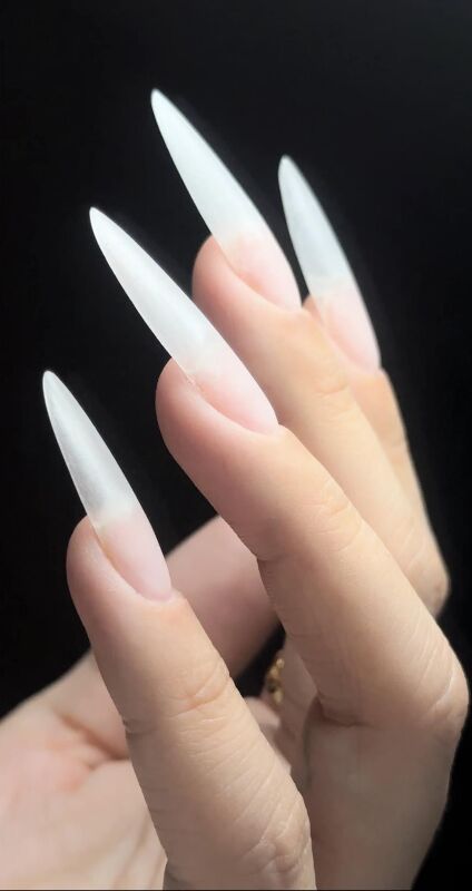 Long milky white stiletto extensions at KK Nail Studio, Long Island City nail salon