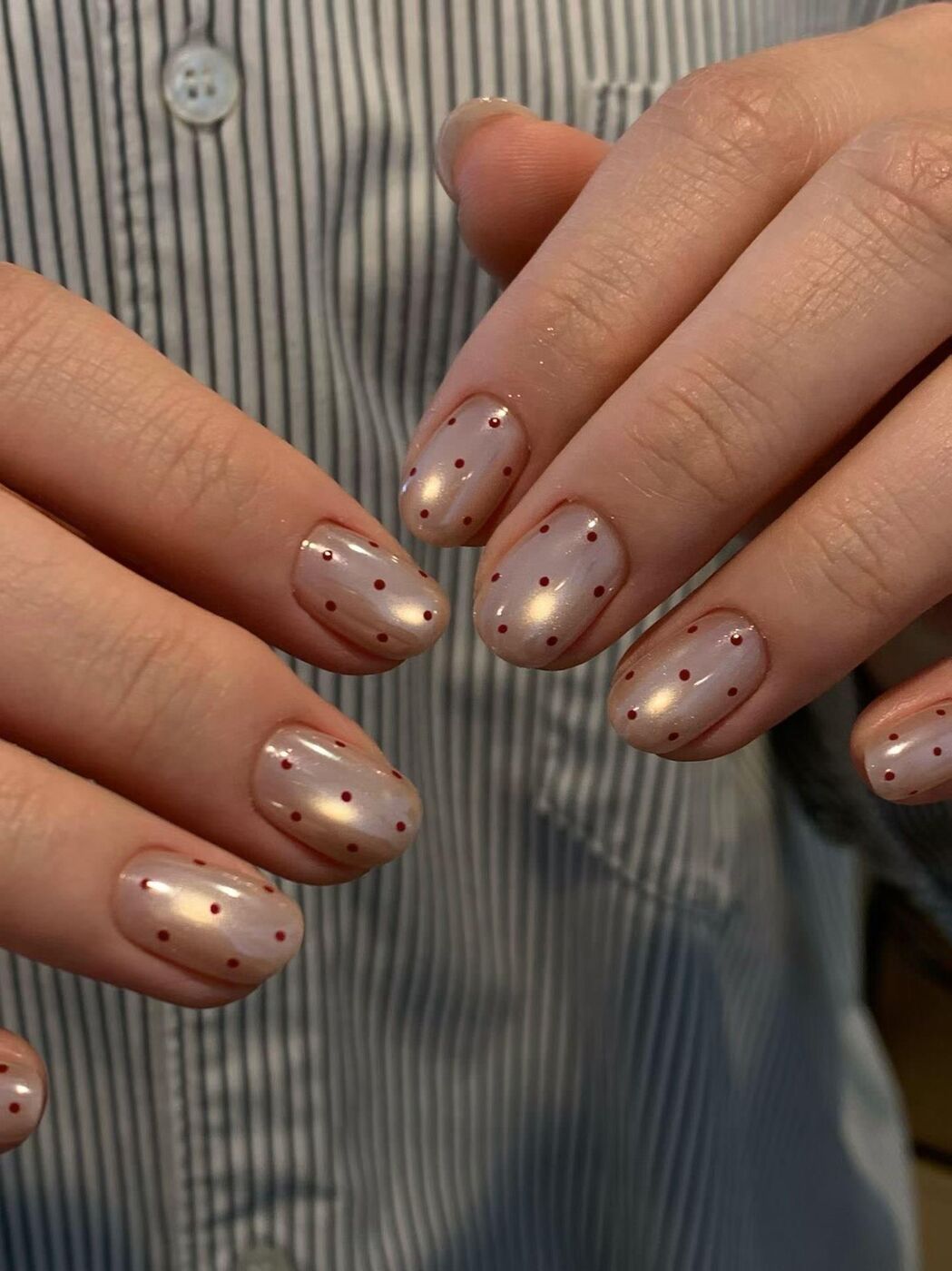 Nude gel with gold dots at KK Nail Studio, Long Island City nail salon