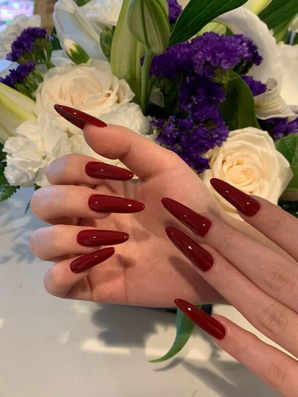 Red stiletto Gel-X extensions at KK Nail Studio, Long Island City nail salon